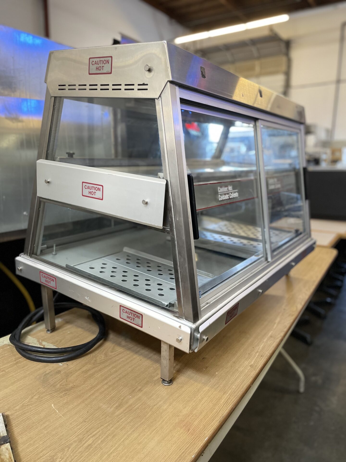 Food display cabinet and heater