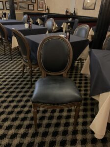 A view of gray dining tables and chairs
